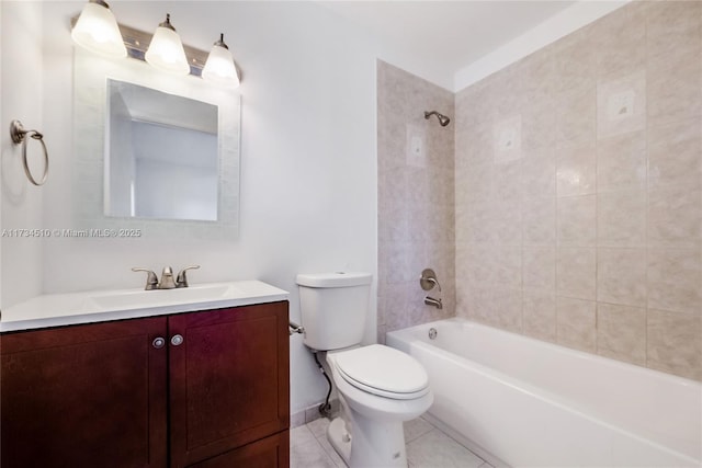 full bathroom with tiled shower / bath combo, vanity, tile patterned floors, and toilet