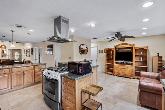 kitchen with island range hood, hanging light fixtures, stainless steel electric range, a textured ceiling, and ceiling fan