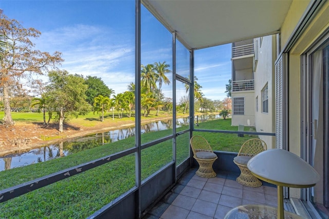 sunroom with a water view