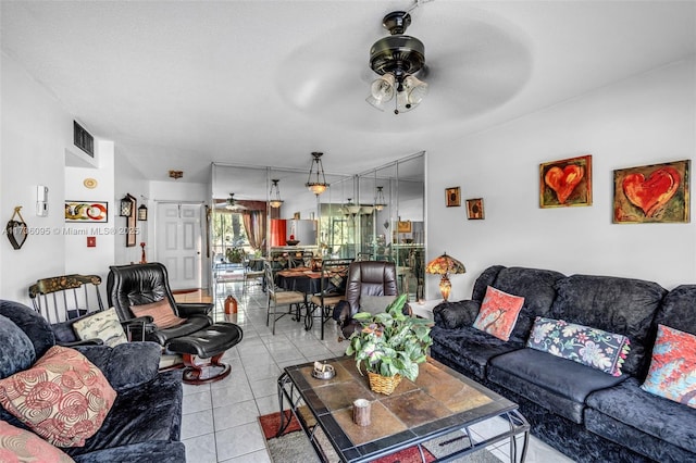 living room with light tile patterned floors and ceiling fan