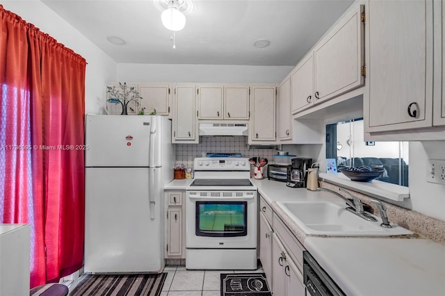 kitchen with backsplash, white appliances, sink, and light tile patterned floors