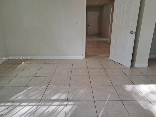 view of tiled spare room