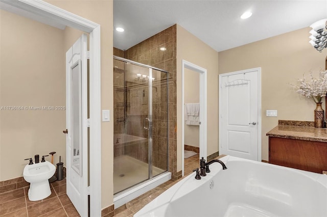 bathroom with a shower stall, a bidet, a bath, and recessed lighting