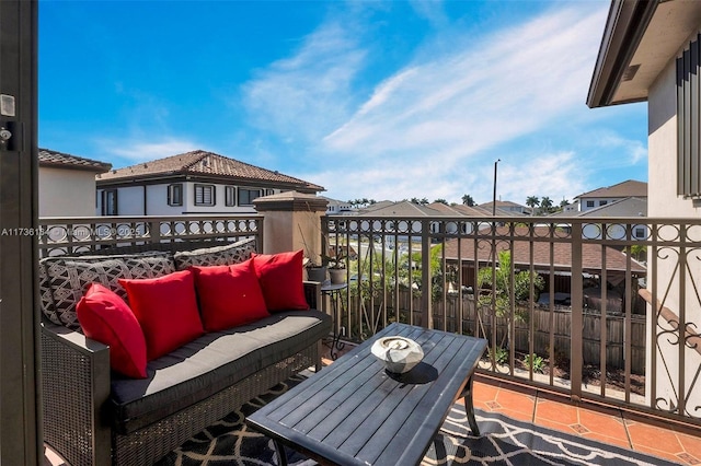 balcony featuring a residential view and an outdoor hangout area