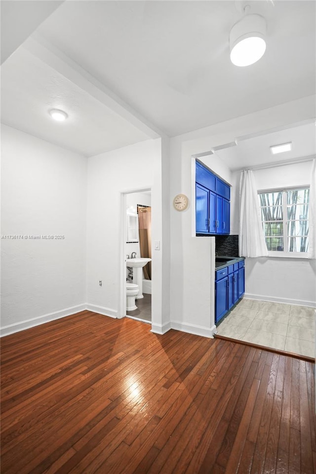 spare room featuring hardwood / wood-style flooring