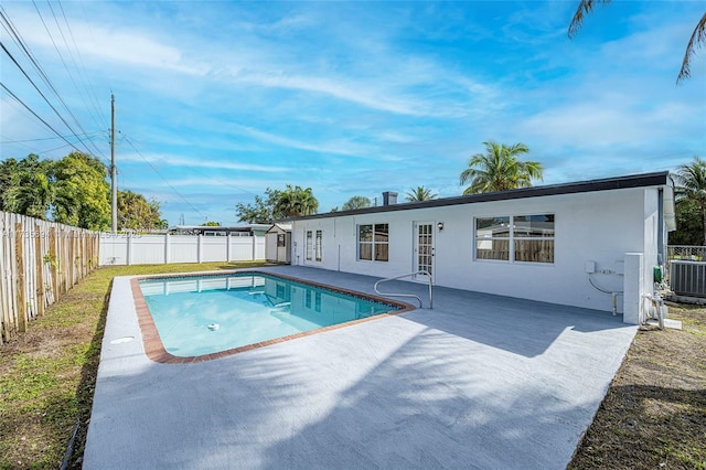 view of pool featuring central AC and a patio area