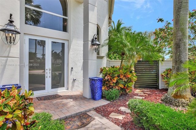 entrance to property featuring french doors