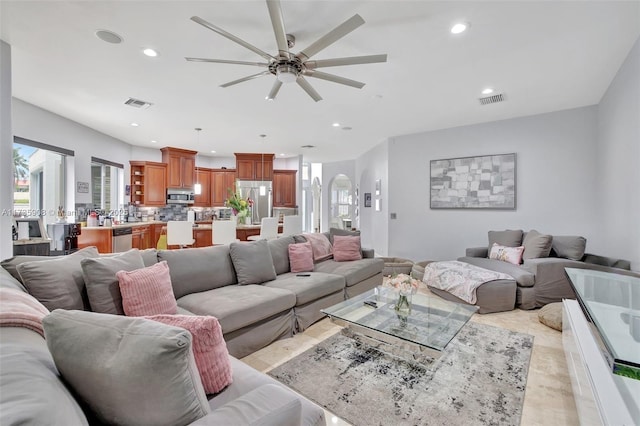 living room with ceiling fan