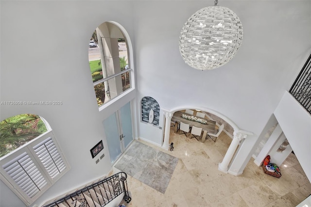 entrance foyer with a chandelier