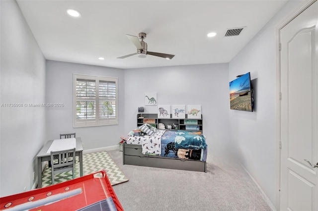 carpeted bedroom featuring ceiling fan