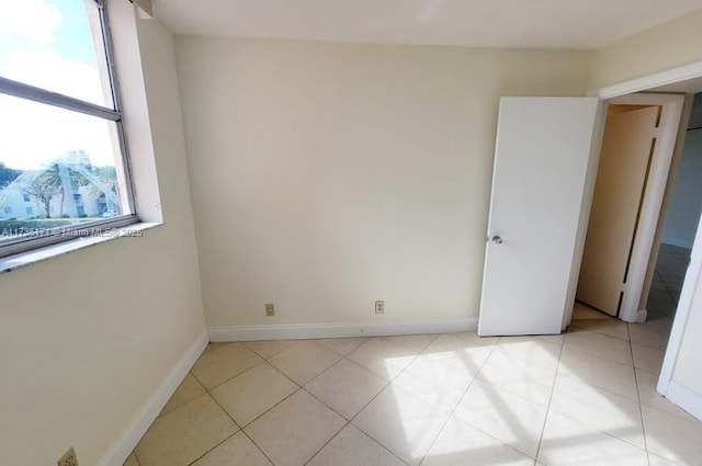 view of tiled spare room