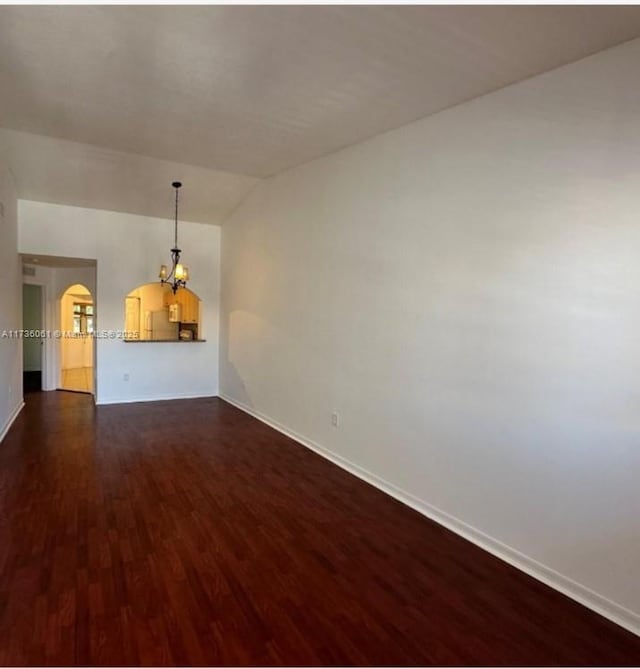 empty room featuring dark hardwood / wood-style floors