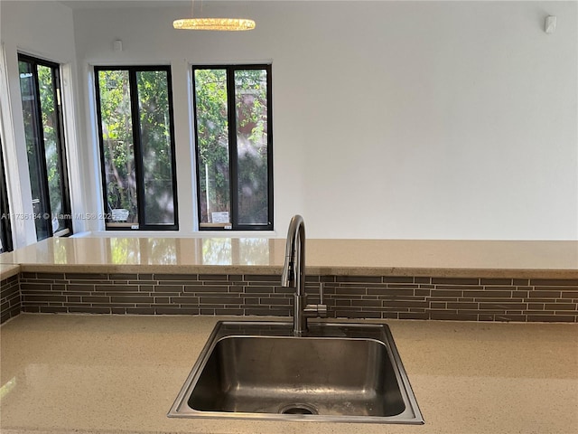 kitchen featuring a healthy amount of sunlight and sink