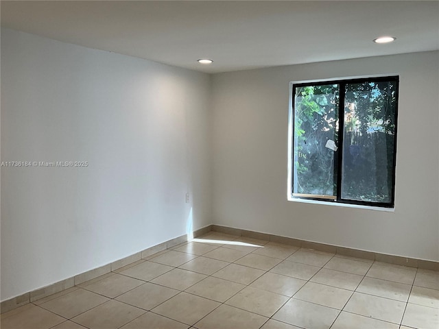 view of tiled empty room