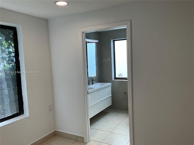 bathroom featuring tile patterned floors and vanity