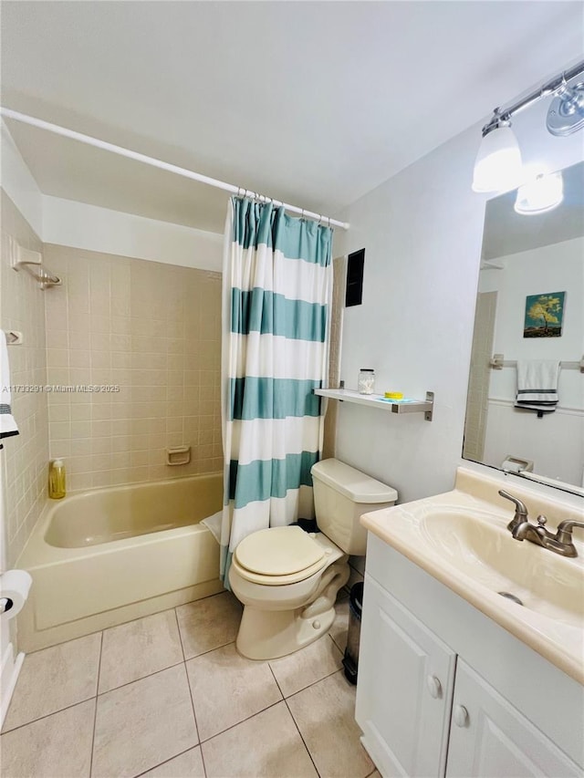 full bathroom featuring shower / bathtub combination with curtain, vanity, tile patterned floors, and toilet