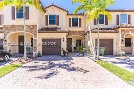 348 NE 37th Ter, Homestead, FL 33033 - mediterranean / spanish home with a garage