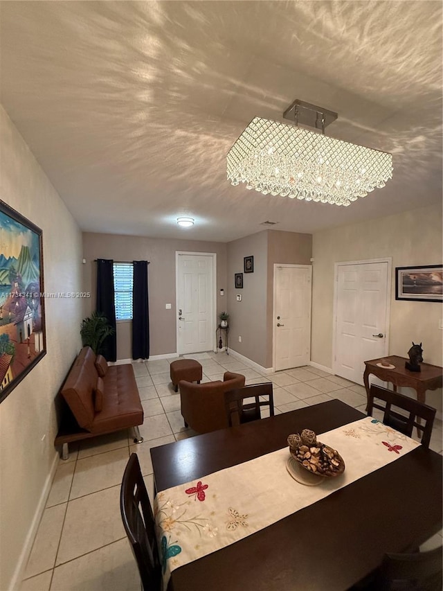 tiled dining area featuring a textured ceiling