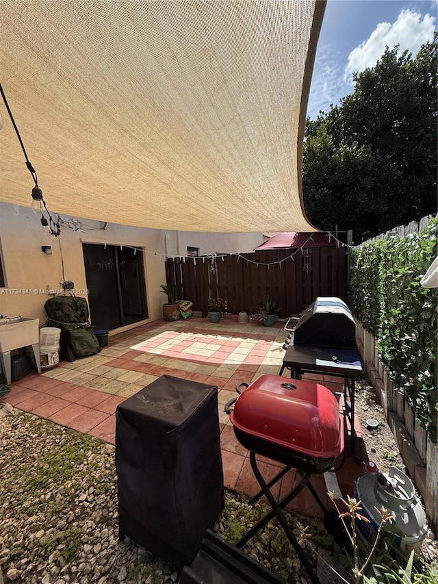 view of patio / terrace featuring a grill