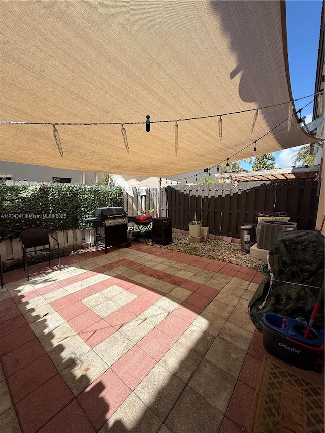 view of patio / terrace with a grill