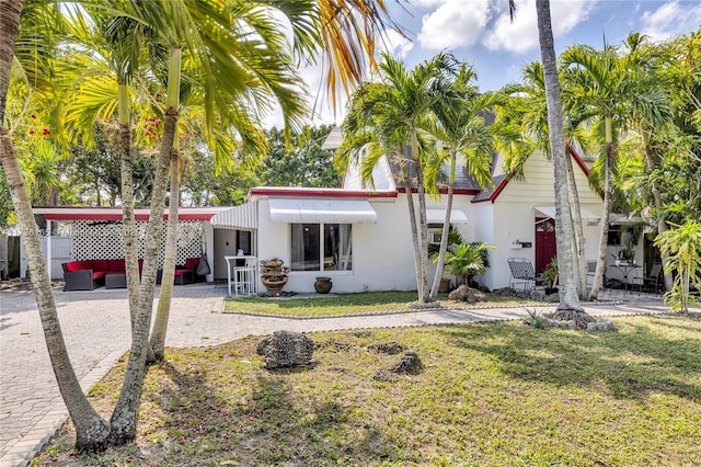 view of front of house with a front yard