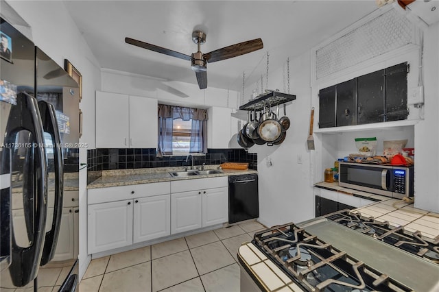 kitchen featuring sink, black appliances, ceiling fan, decorative backsplash, and white cabinets