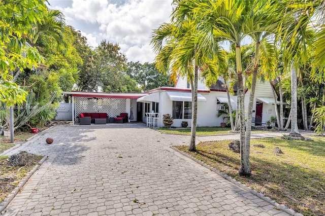 view of front of house with a front yard