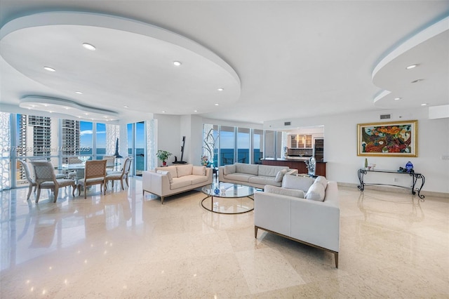 living room with a wall of windows