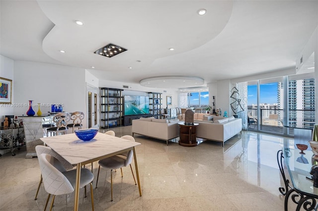 dining room with expansive windows