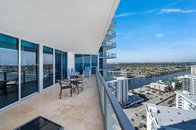 balcony featuring a water view