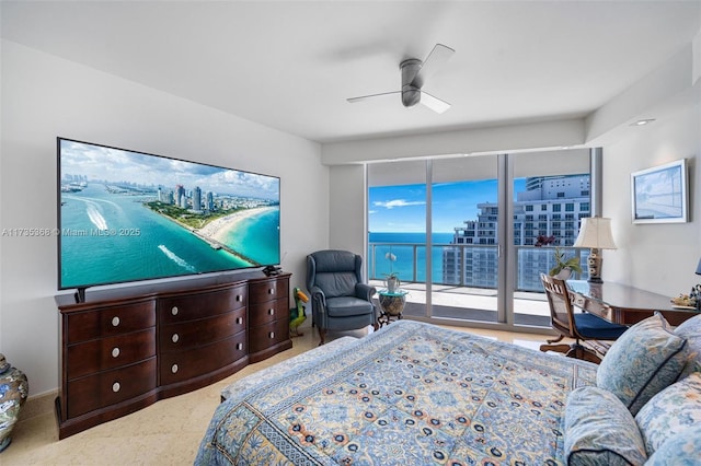 bedroom featuring access to outside and ceiling fan