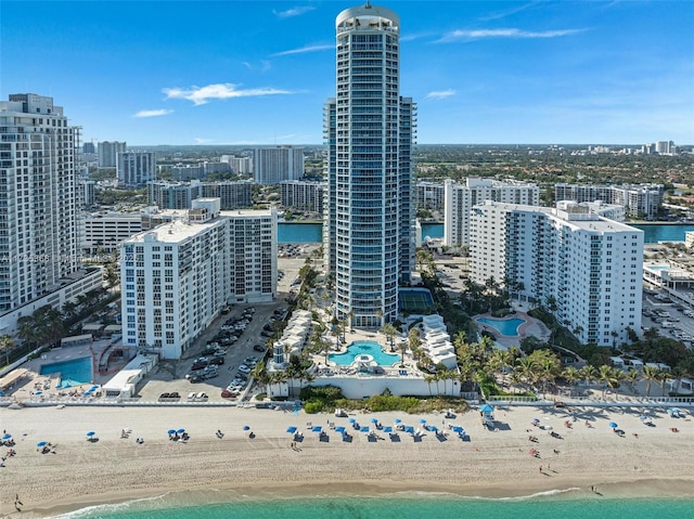 aerial view with a view of the beach and a water view