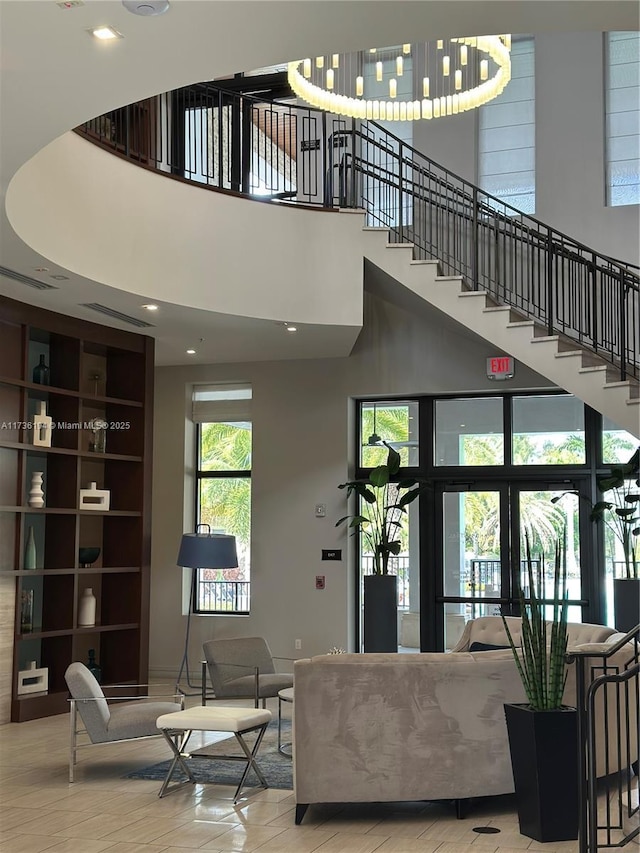 living room featuring a high ceiling