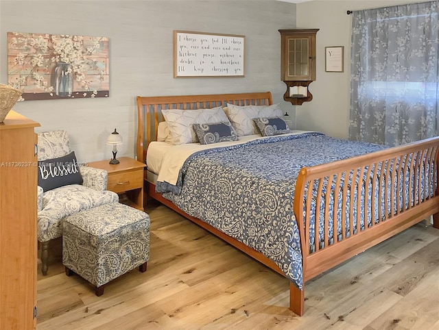 bedroom featuring hardwood / wood-style floors