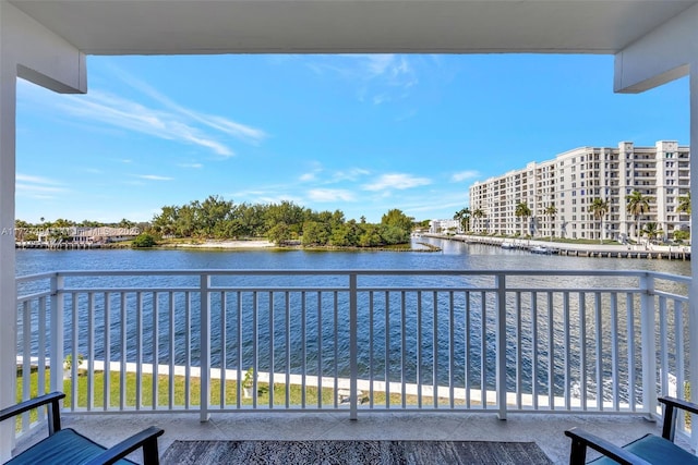 wooden deck with a water view