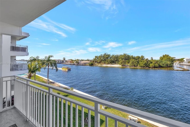 balcony featuring a water view