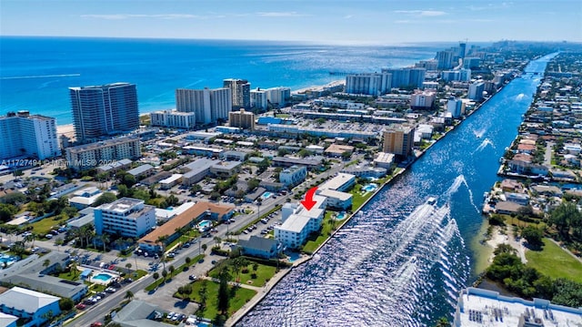 drone / aerial view with a view of city and a water view