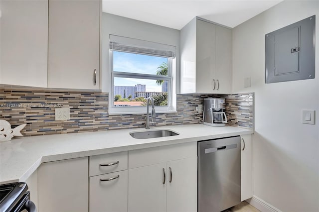 kitchen featuring electric panel, range with electric cooktop, decorative backsplash, dishwasher, and a sink