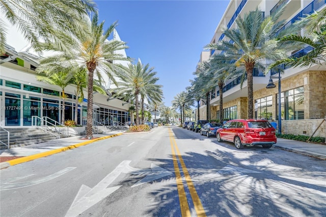 view of street featuring curbs and sidewalks