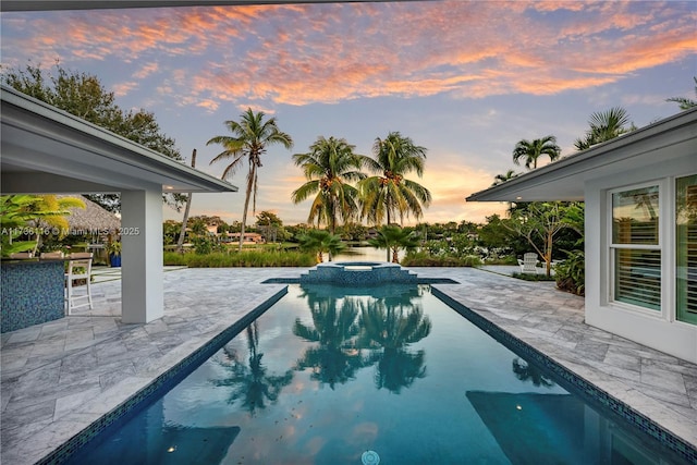 16141 W Troon Cir, Miami Lakes, FL 33014 - view of swimming pool with a patio area and a pool with connected hot tub