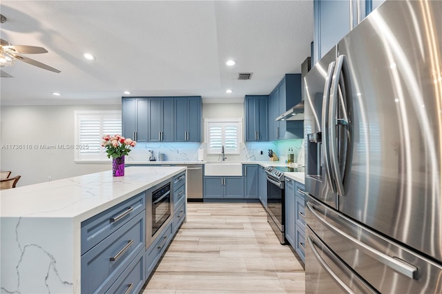 16141 W Troon Cir, Miami Lakes, FL 33014 - kitchen featuring appliances with stainless steel finishes, a sink, ceiling fan, recessed lighting, and backsplash