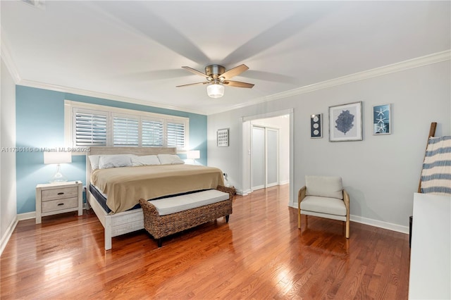 16141 W Troon Cir, Miami Lakes, FL 33014 - bedroom with ornamental molding, baseboards, wood finished floors, and a ceiling fan