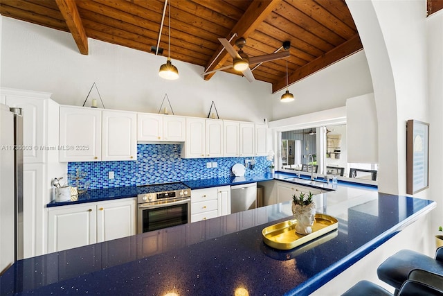 kitchen featuring white cabinetry, dishwasher, sink, and oven