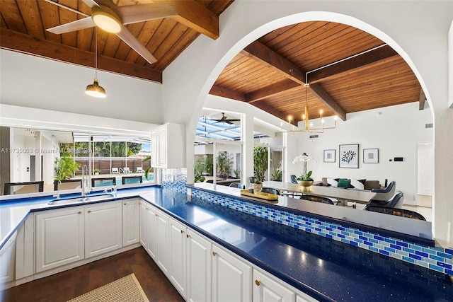 interior space featuring sink and ceiling fan