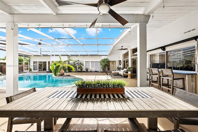 view of swimming pool with a bar, an outdoor living space, a patio area, and ceiling fan