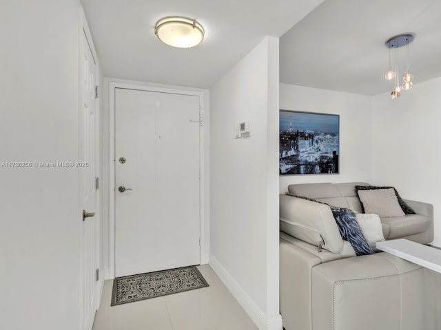 entrance foyer featuring light tile patterned floors