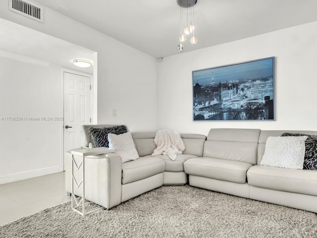 living room featuring tile patterned floors