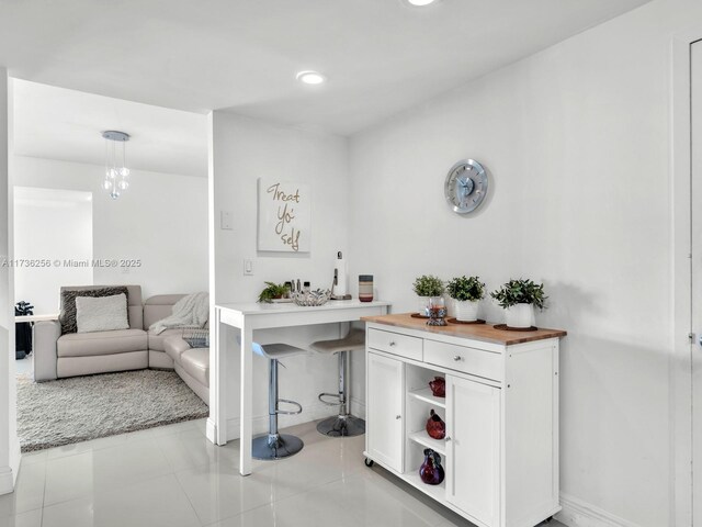 2030 S Ocean Dr Unit 1414, Hallandale Beach, FL 33009 - bar area with recessed lighting, baseboards, and pendant lighting