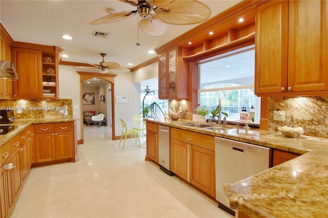 kitchen featuring sink, ornamental molding, light stone countertops, and dishwasher