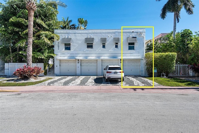 view of front of property with a garage